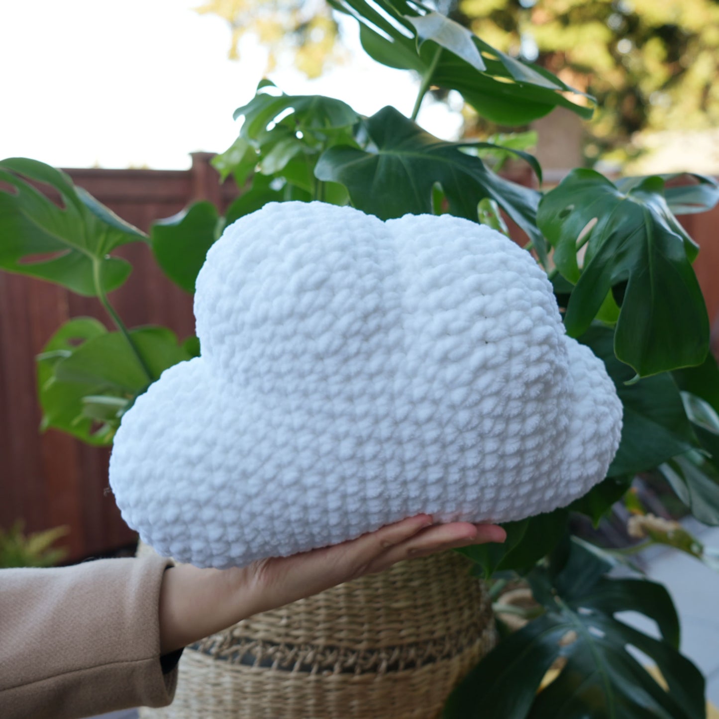 cute soft white crochet cloud with sad face, stuffed animal plushie toy handmade with yarn pillow
