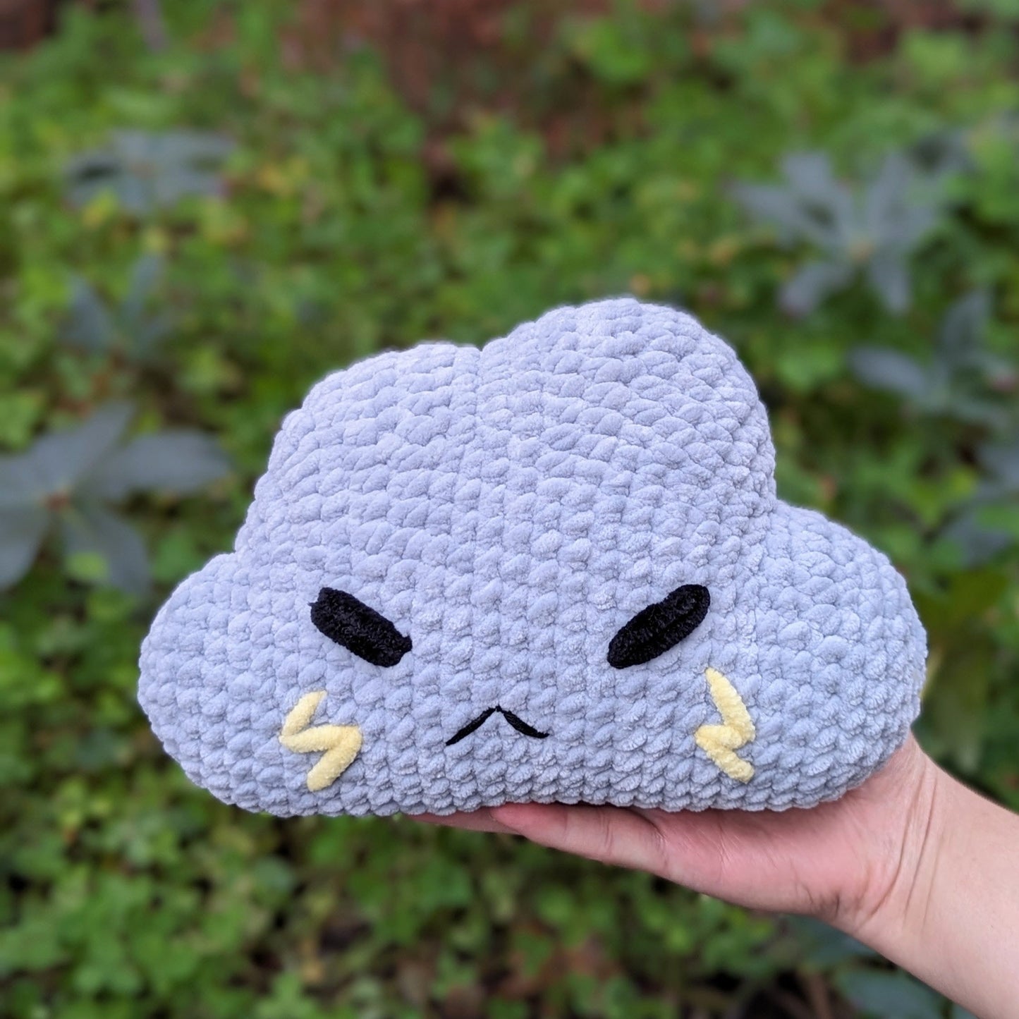 cute soft gray crochet cloud with grumpy face, stuffed animal toy plushie handmade with yarn