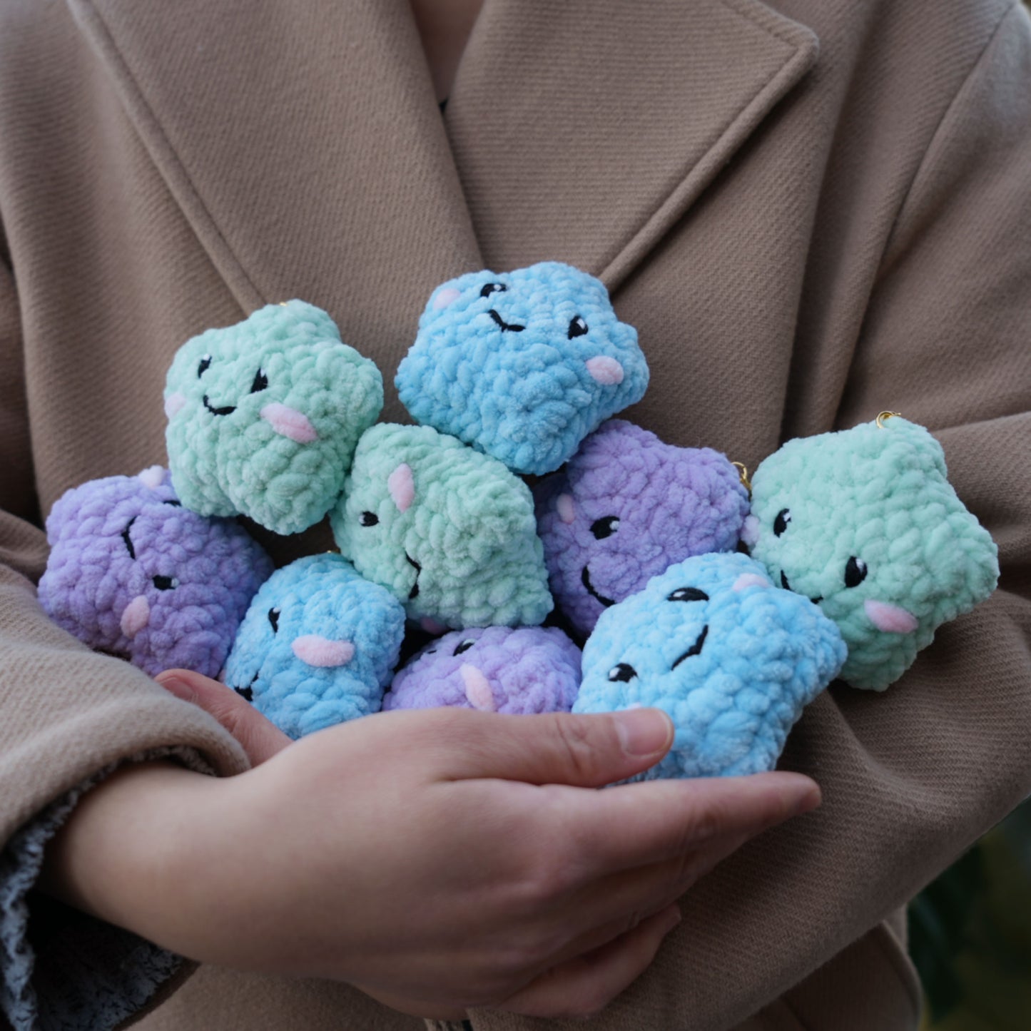 cute soft purple crochet star with happy face, stuffed animal plushie toy handmade with yarn keychain